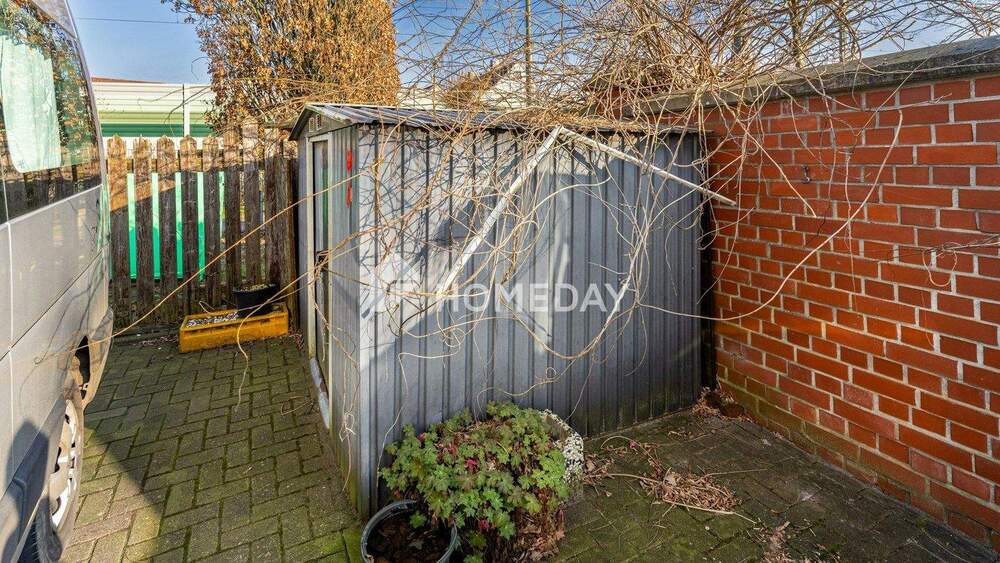 Schmuckstück mit Altbau-Charm mit praktischer Einliegerwohnung & Carports in zentraler Lage | Brake 7 zimmer