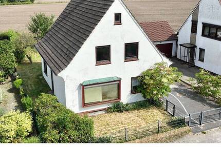 Freistehendes Einfamilienhaus mit beheiztem Wintergarten und Garage 7 zimmer