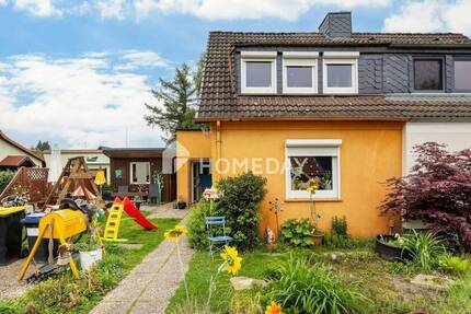 Doppelhaushälfte mit zwei Eingängen und Wintergarten