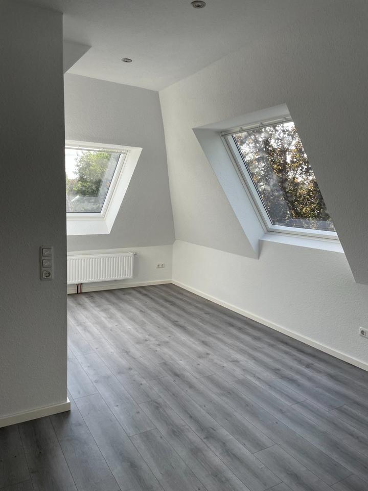 Erstbezug: Stilvolle 1,5-Zimmer-Dachgeschoßwohnung in Wremen